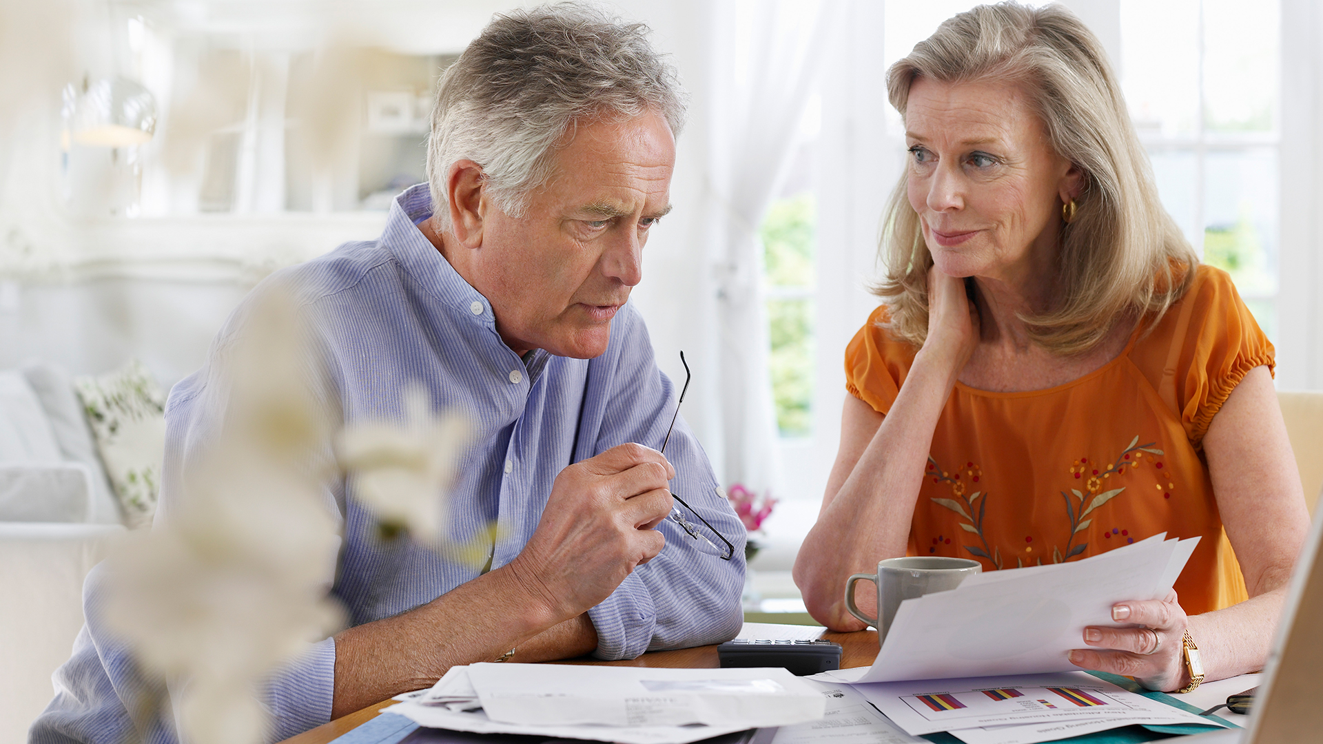 Older couple doing retirement planning